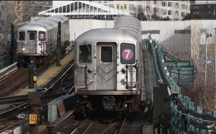 A No. 7 subway train arrives at the Mets-Willets point station. (Kathy Willens/AP)